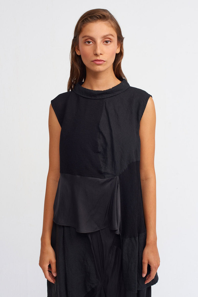 Nu Solid Sleeveless Asymmetrical Blouse Black